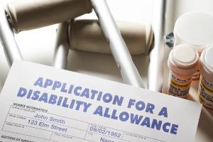 pill bottles with crutches and disability application